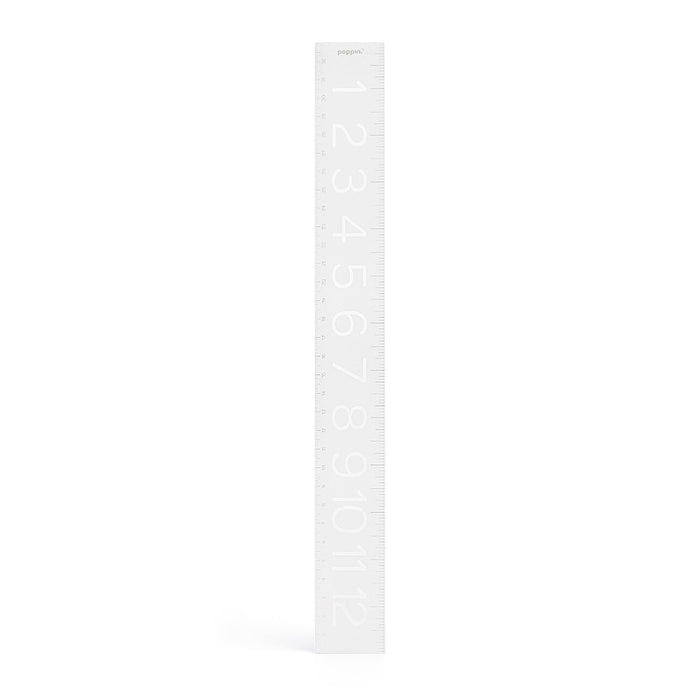 White children's growth chart ruler with numbers and stars on a white background. (White)