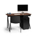 Modern work desk setup with computer, black chair, and office supplies (Walnut)