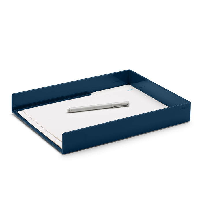 Navy blue desk tray with white paper sheets and silver pen on white background. (Slate Blue)