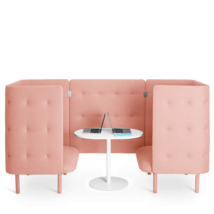 Pink office pod with comfortable chairs and a laptop on a white table against a white background. (Blush-Blush)
