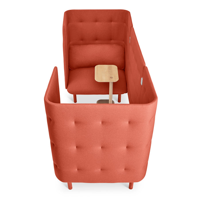 Modern coral tufted armchair with wooden legs isolated on white background. (Brick-Brick)(Brick-Brick)