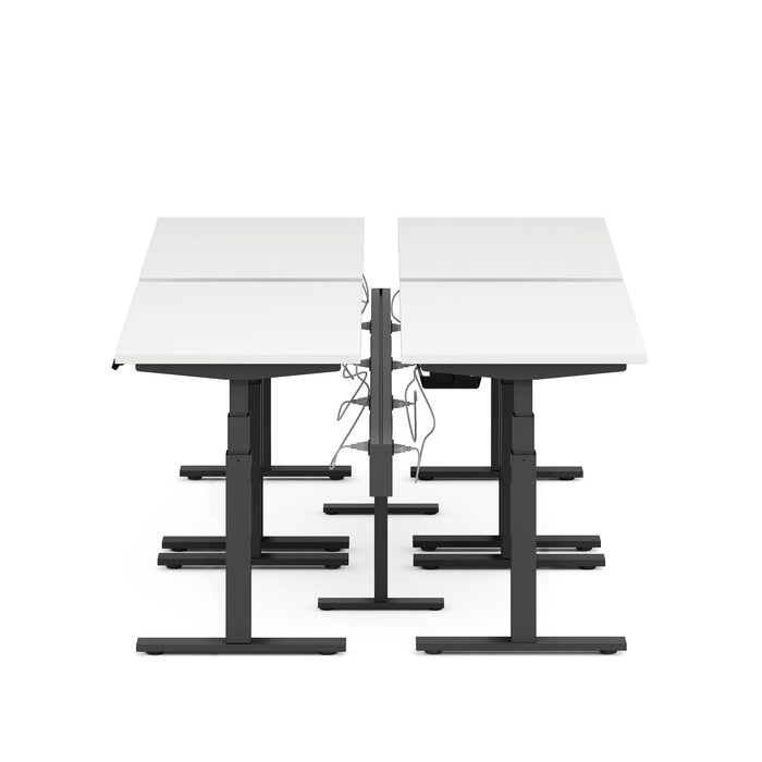 Dual sit-to-stand desks with adjustable height and cable management, isolated on white background. (Charcoal-100&quot;)