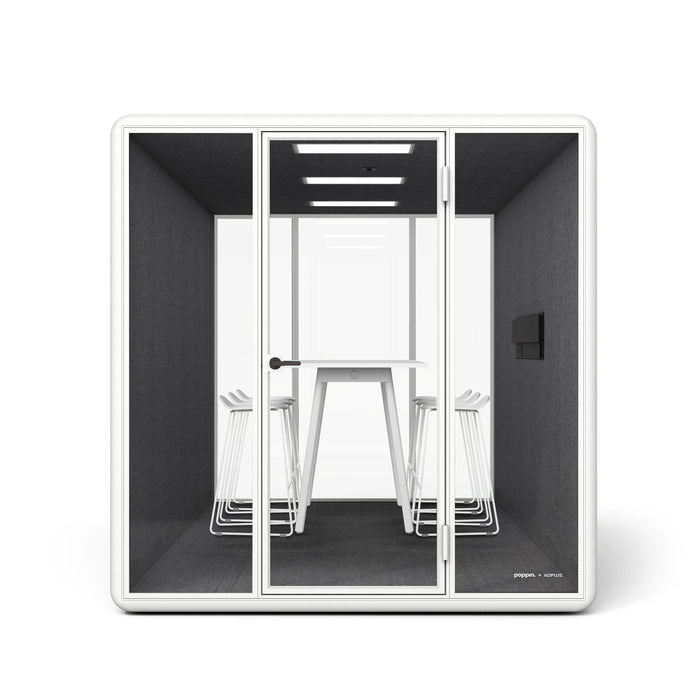 Modern office pod with white chair, desk, and stackable stools on white background. (White)
