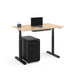 Modern standing desk with laptop and black filing cabinet on white background. (Natural Oak-48&quot;)