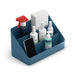 Blue cleaning caddy with spray bottles, sponges, and smartphone on white background. (Slate Blue)