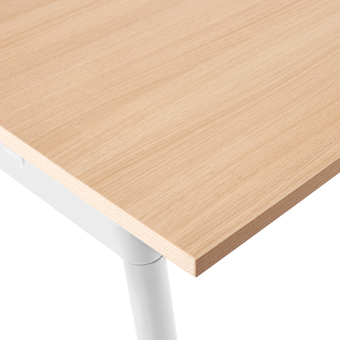 Wooden tabletop with modern metal legs on a white background. (Natural Oak)