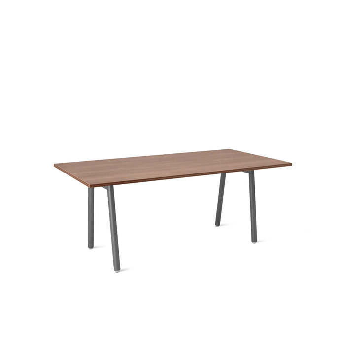 Modern wooden table with metal legs on a white background. (Walnut)