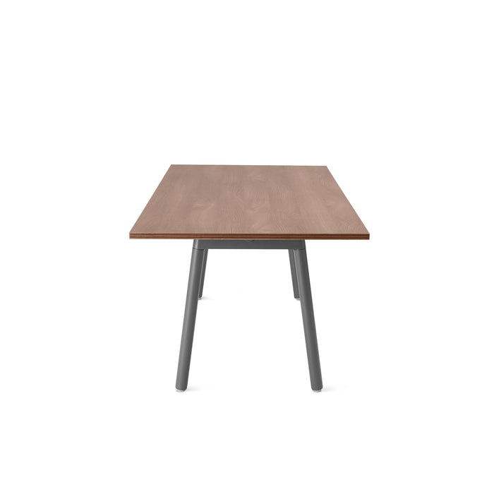 Modern wooden table with black metal legs on a white background. (Walnut)