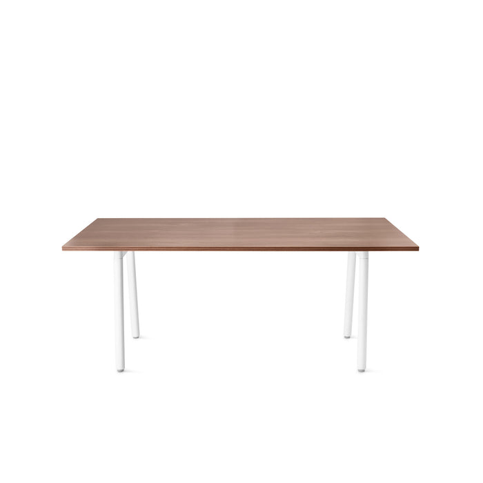 Modern wooden table with white legs on a white background. (Walnut)