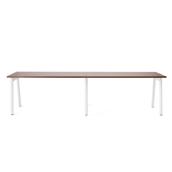 Modern minimalist wooden table with white legs on a white background. (Walnut-57&quot;)