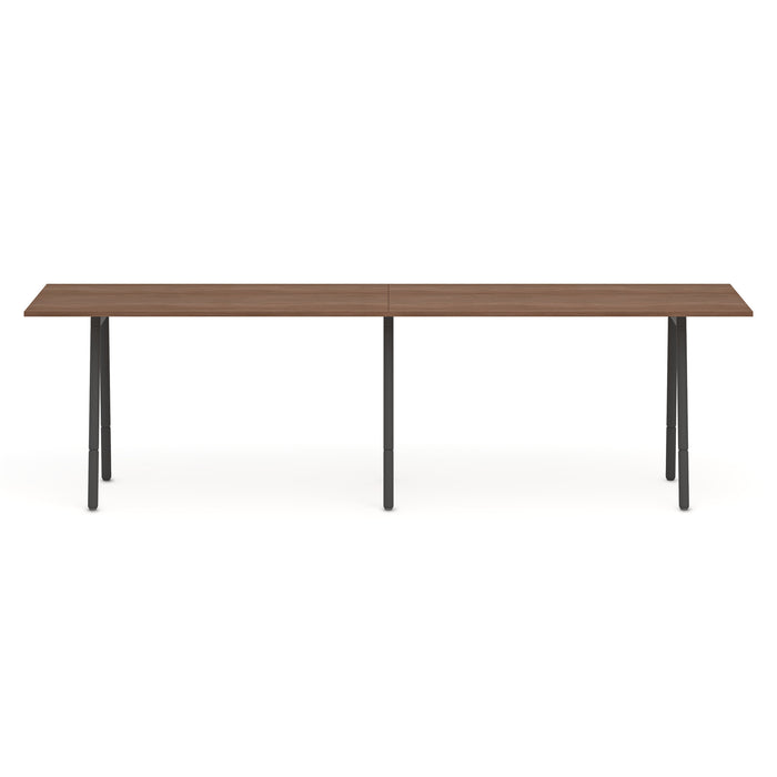 Modern wood dining table with black metal legs on white background. (Walnut-144&quot; x 36&quot;)
