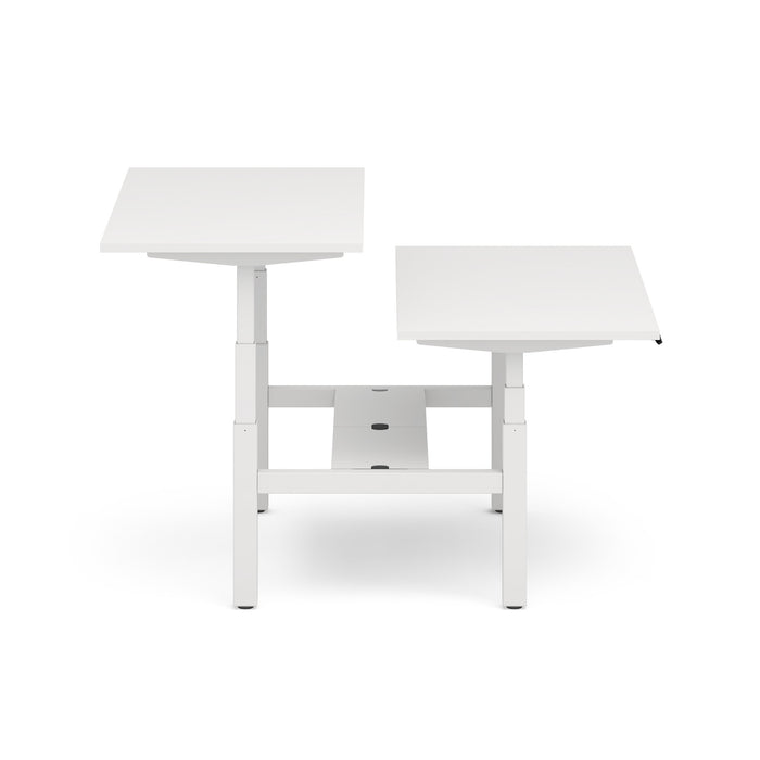 Two white adjustable standing desks on a white background. (White-60&quot;)