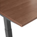 Close-up view of a modern wooden desk surface with a metal leg. (Walnut-57&quot;)(Walnut-47&quot;)(Walnut-60&quot;)