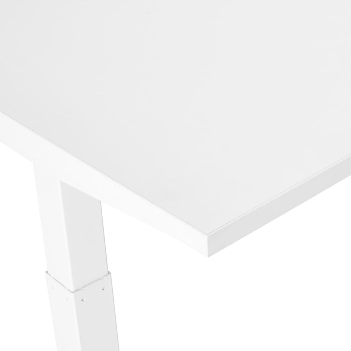 Corner of a white minimalist table against a white background. (White-57&quot;)(White-47&quot;)(White-60&quot;)