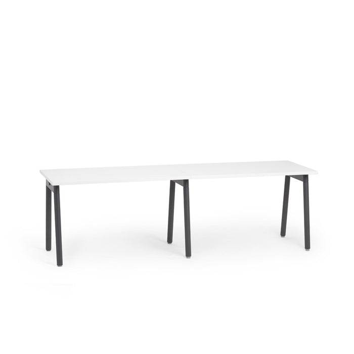 White modern rectangular table with black legs on a white background. (White-47&quot;)