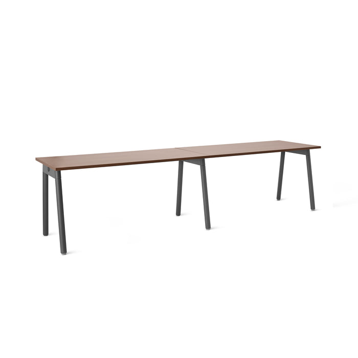 Modern brown wooden table with black legs on white background. (Walnut-57&quot;)