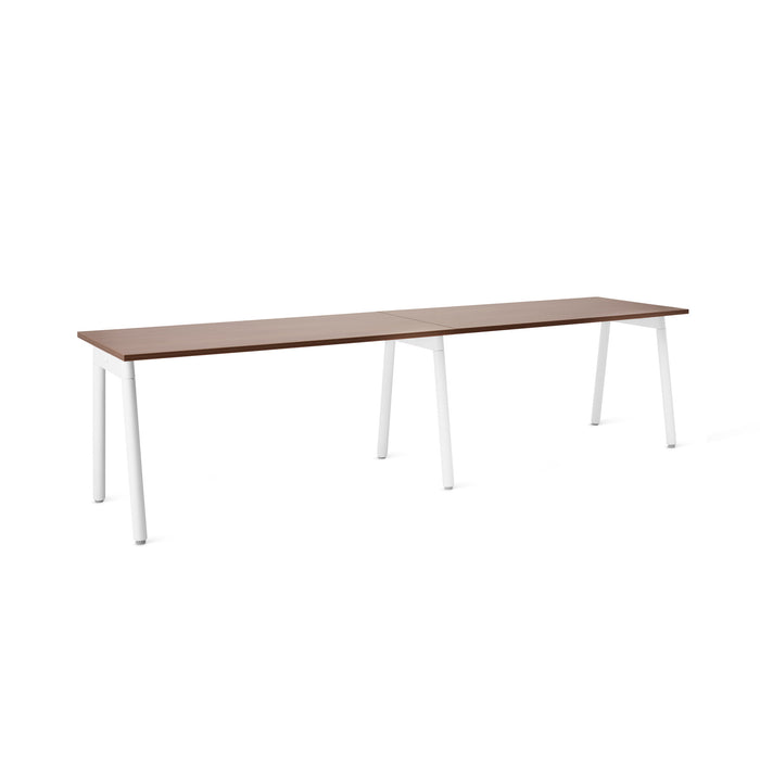 Modern minimalist brown wooden table with white legs on a white background. (Walnut-57&quot;)