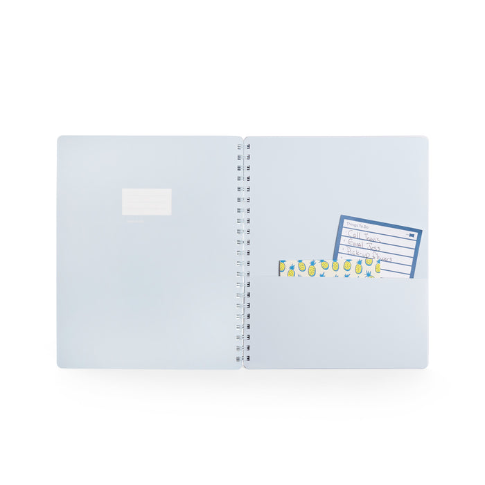 Blue spiral notebook with stickers and white background. (Sky)