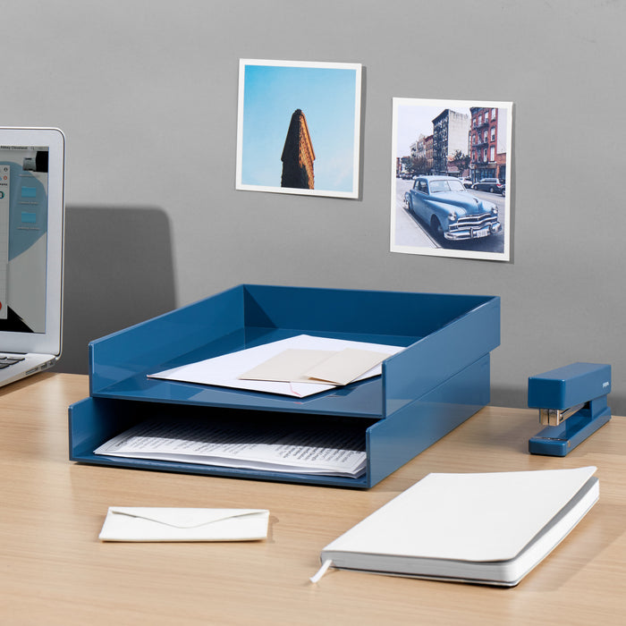 Modern blue desk organizer on a worktable with laptop, papers, and stapler (Slate Blue)