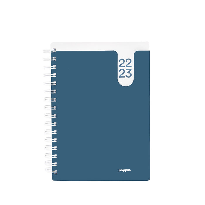 Blue spiral-bound 2023 planner notebook with white numbering on cover. (Slate Blue)