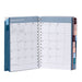 Open planner with September 2022 monthly calendar view on desk. (Slate Blue)