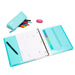 Open planner with notes and colorful pens on white background. (Aqua)