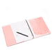 Open pink planner with black pen and handwritten notes on white background. (Blush)
