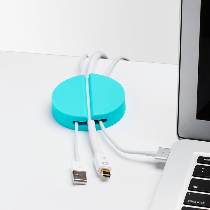 Blue cable organizer on desk next to laptop with USB cables (Aqua)