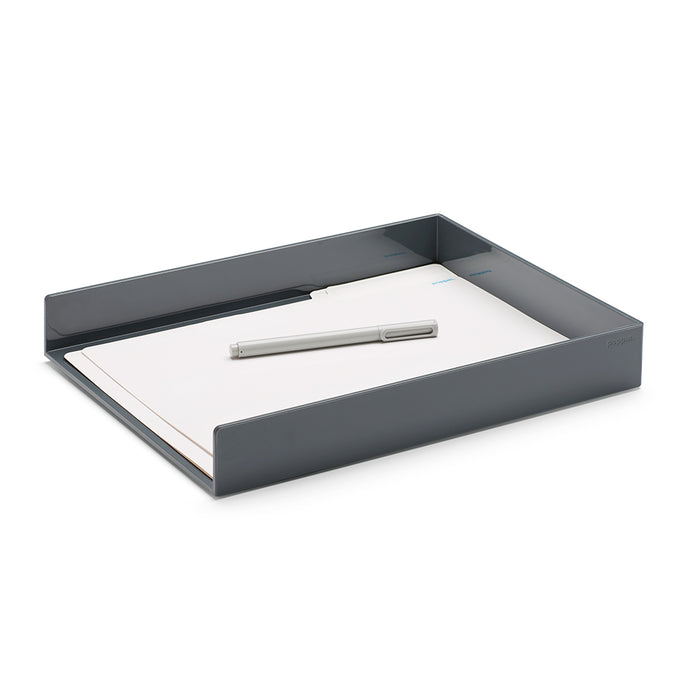 Black desk tray with blank white paper and silver pen on white background. (Dark Gray)