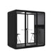 Modern office phone booth with glass doors and two chairs. (Black)