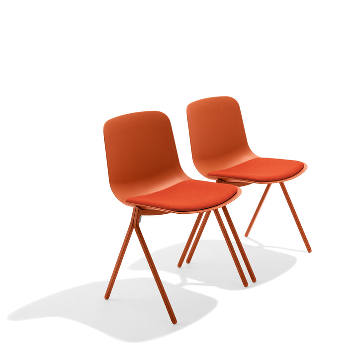 Two modern orange chairs on a white background (Brick)