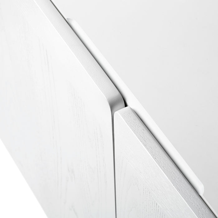 Close-up of white textured furniture corner on a white background. (White)