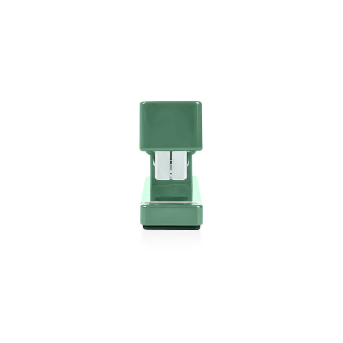 Green office stapler on a white background. (Sage)