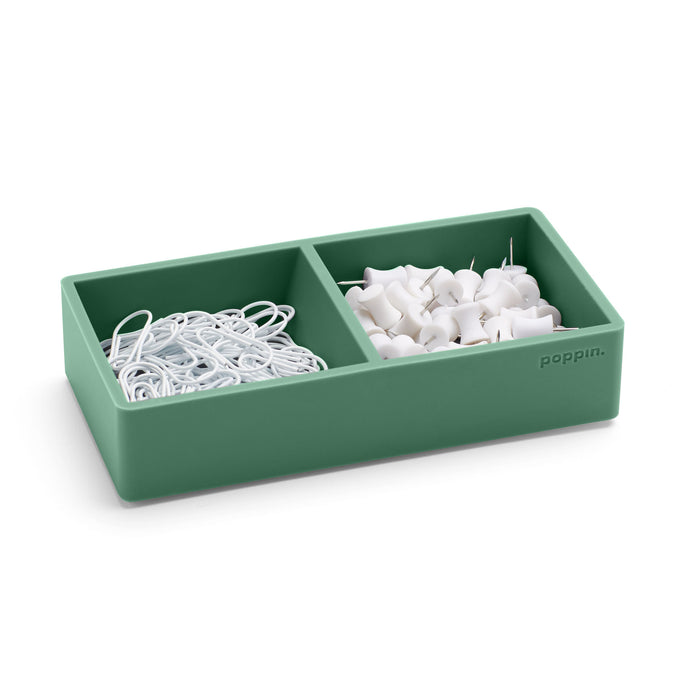 Green desk organizer with white paper clips and push pins on white background. (Sage)