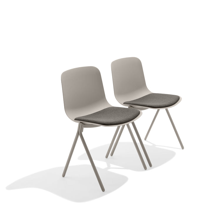Two modern gray chairs with metal legs on a white background. (Warm Gray)
