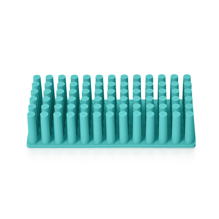Teal silicone ice cube tray with cylindrical molds isolated on white background (Aqua)