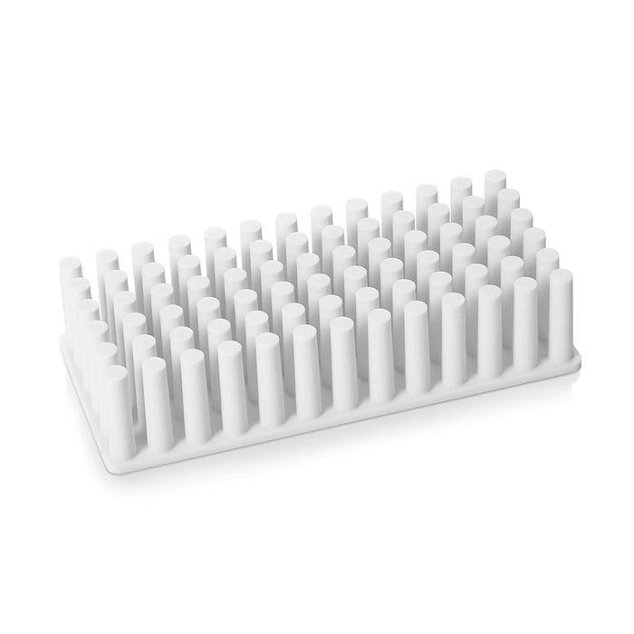 White plastic test tube rack with empty slots on a white background. (White)