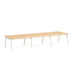 Long beige modular office table with white legs on a white background. (Natural Oak-57&quot;)