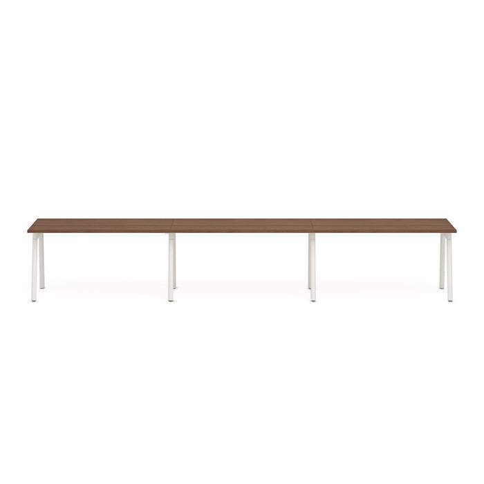 Long modern brown office table with white legs on a white background. (Walnut-57&quot;)