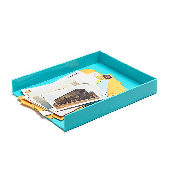 Blue tray holding various documents and letters on a white background. (White)(Aqua)
