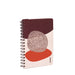 Modern spiral notebook with abstract cover design on white background. (Blush)