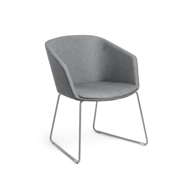 Modern gray upholstered chair with metal legs on white background. (Gray)