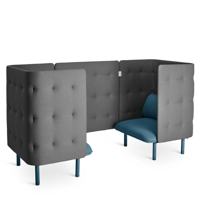 Modern gray upholstered high-back booth seating with blue cushions on white background. (Dark Blue-Dark Gray)