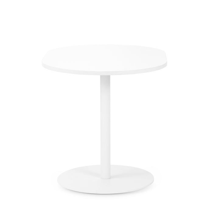 Modern white round pedestal table on a white background. 