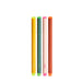 Colorful markers standing vertically on white background 