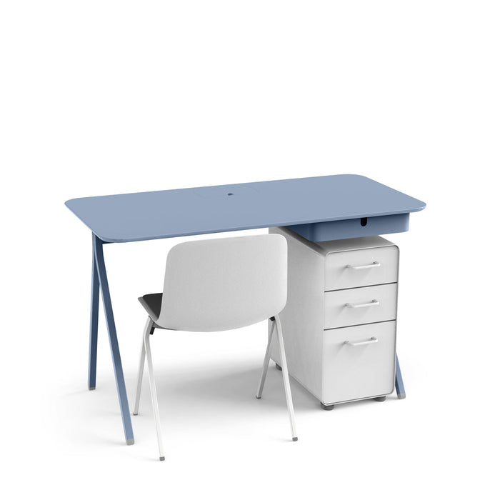 Modern blue office desk with white pedestal drawers and a gray chair on a white background. (Sky)