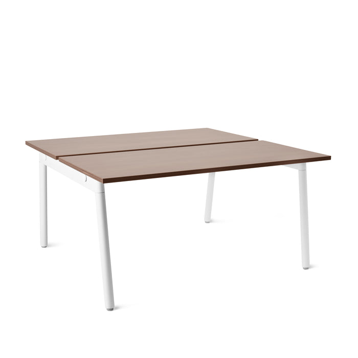 Modern brown wooden table with white legs on a white background. (Walnut-57&quot;)