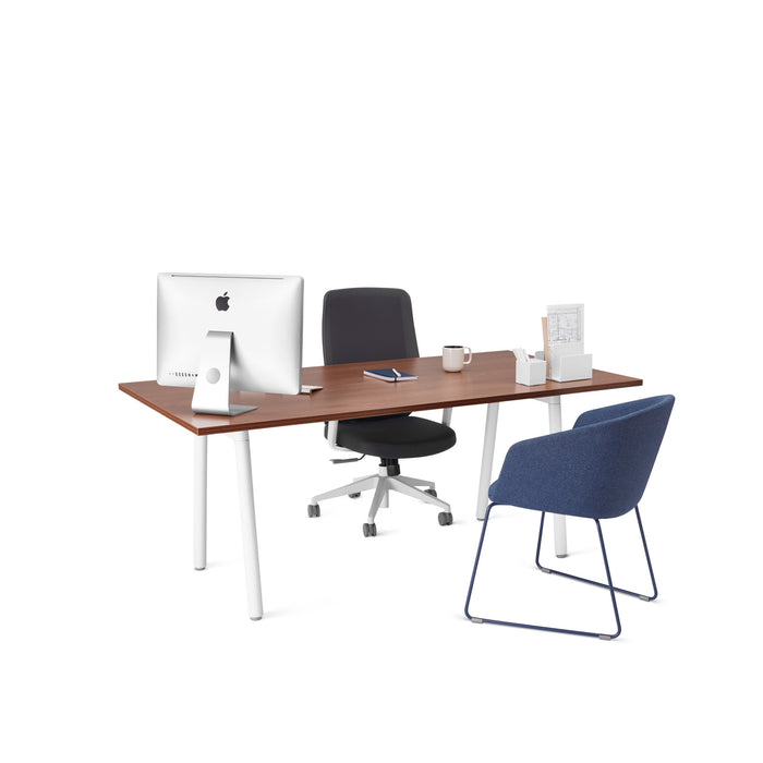 Modern office desk setup with iMac, chair, notebook, and blue accent chair on white background. (Walnut)(Walnut)
