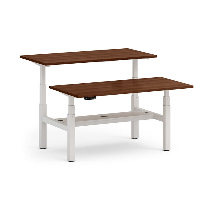 Two-tier modern standing desk with a wooden finish and white frame. (Walnut-60&quot;)