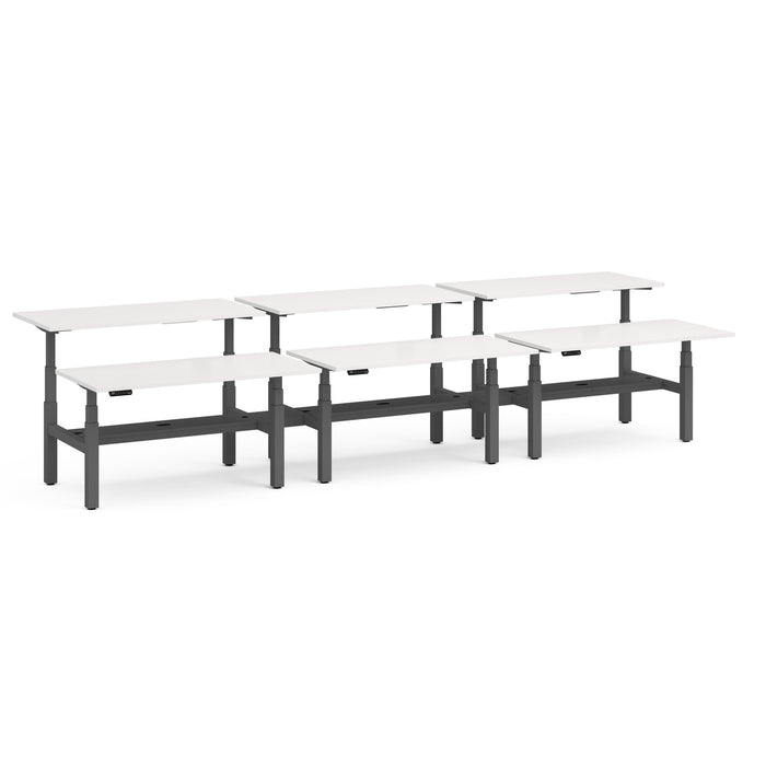 Modular white office desks in a row with black frames on a white background. (White-60&quot;)
